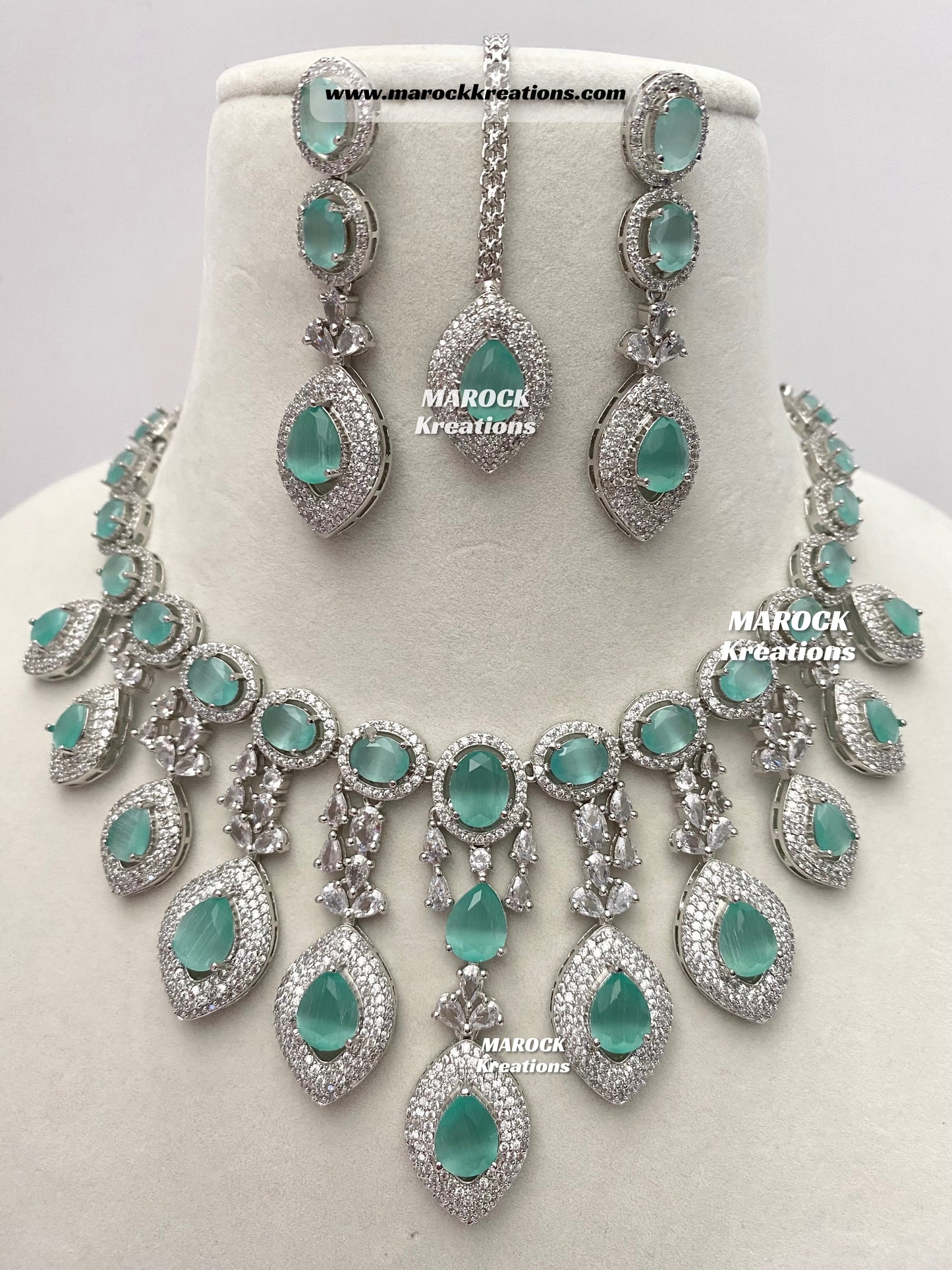 Silver American Diamond Necklace set comes with earrings and tikka