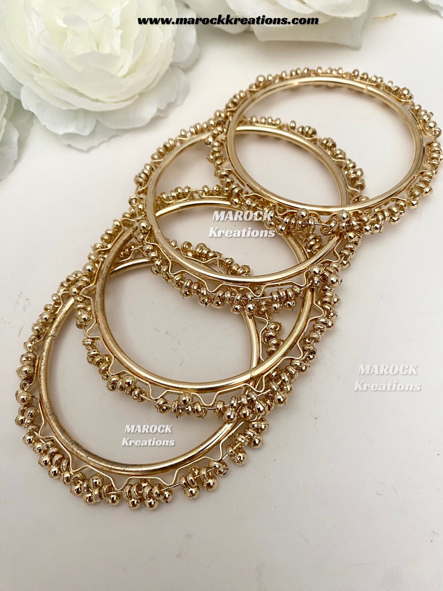 Bailey Gold toned ghungroo style clusters bangles (come in a pair)