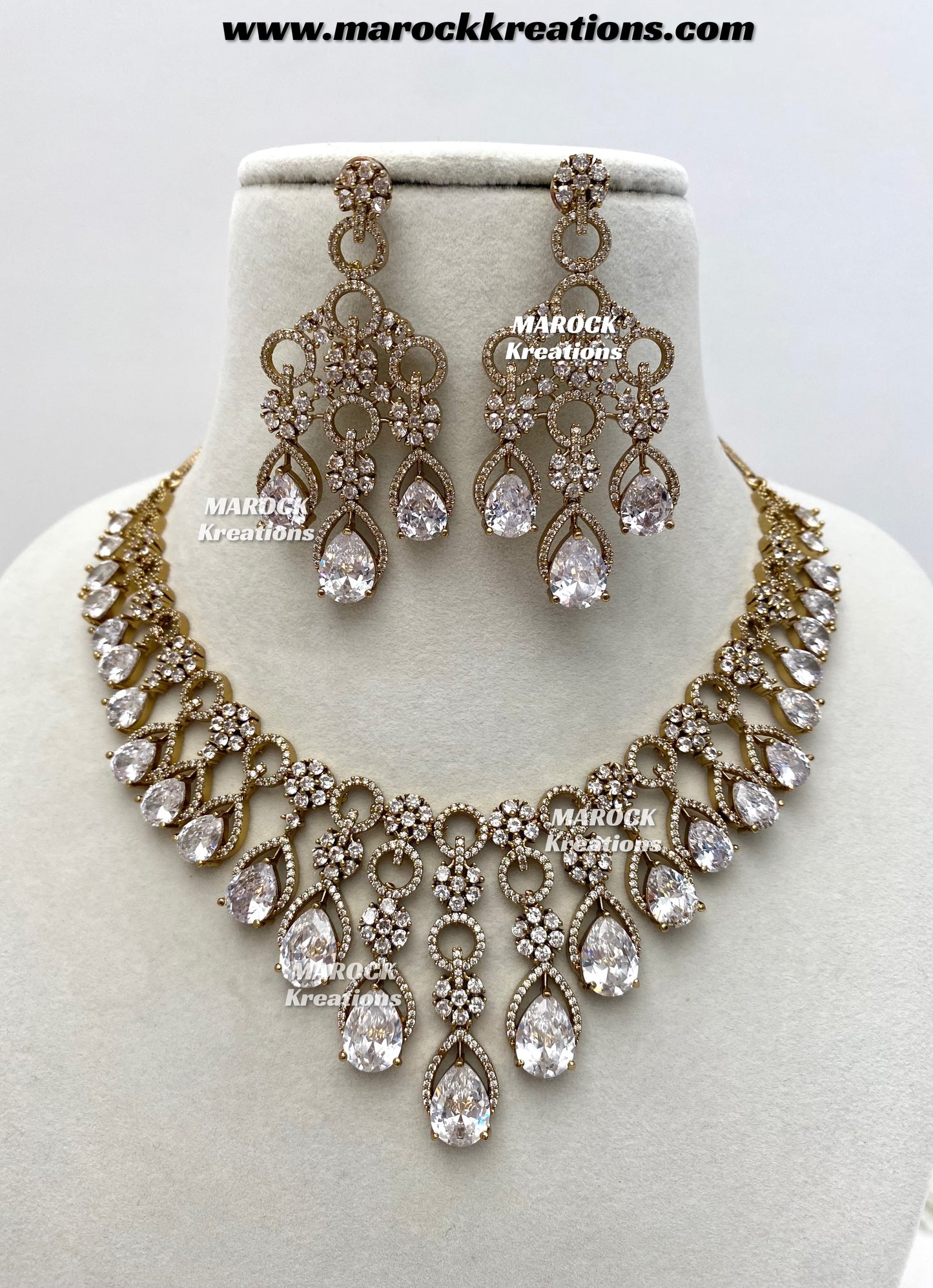 Anshika Antique Gold American Diamond Statement Necklace set