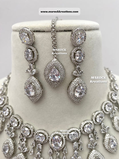 Silver American Diamond Necklace set comes with earrings and tikka