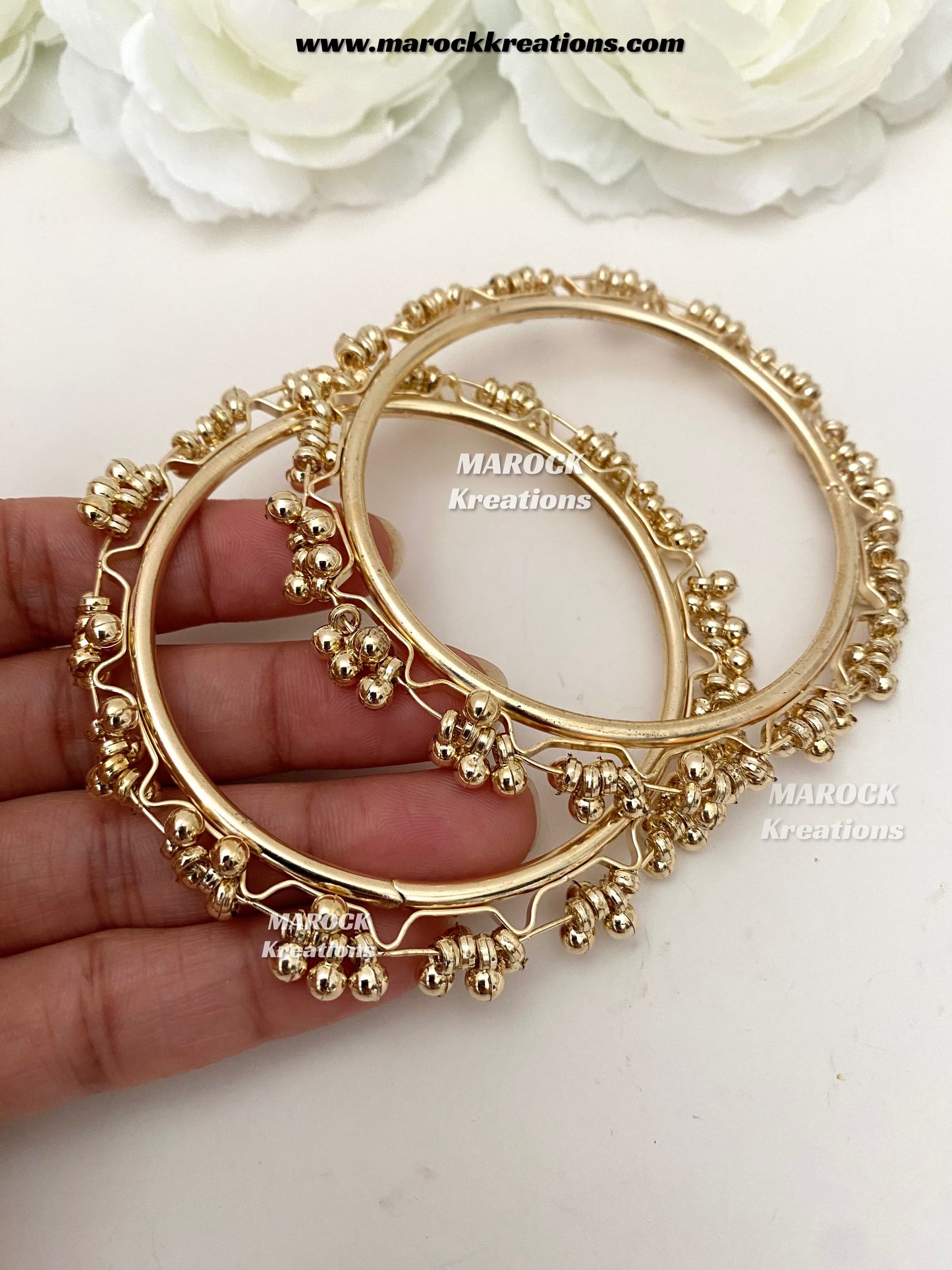 Bailey Gold toned ghungroo style clusters bangles (come in a pair)