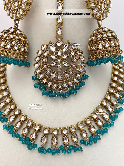 Kundan Necklace set comes with Jhumki Earrings and Tikka