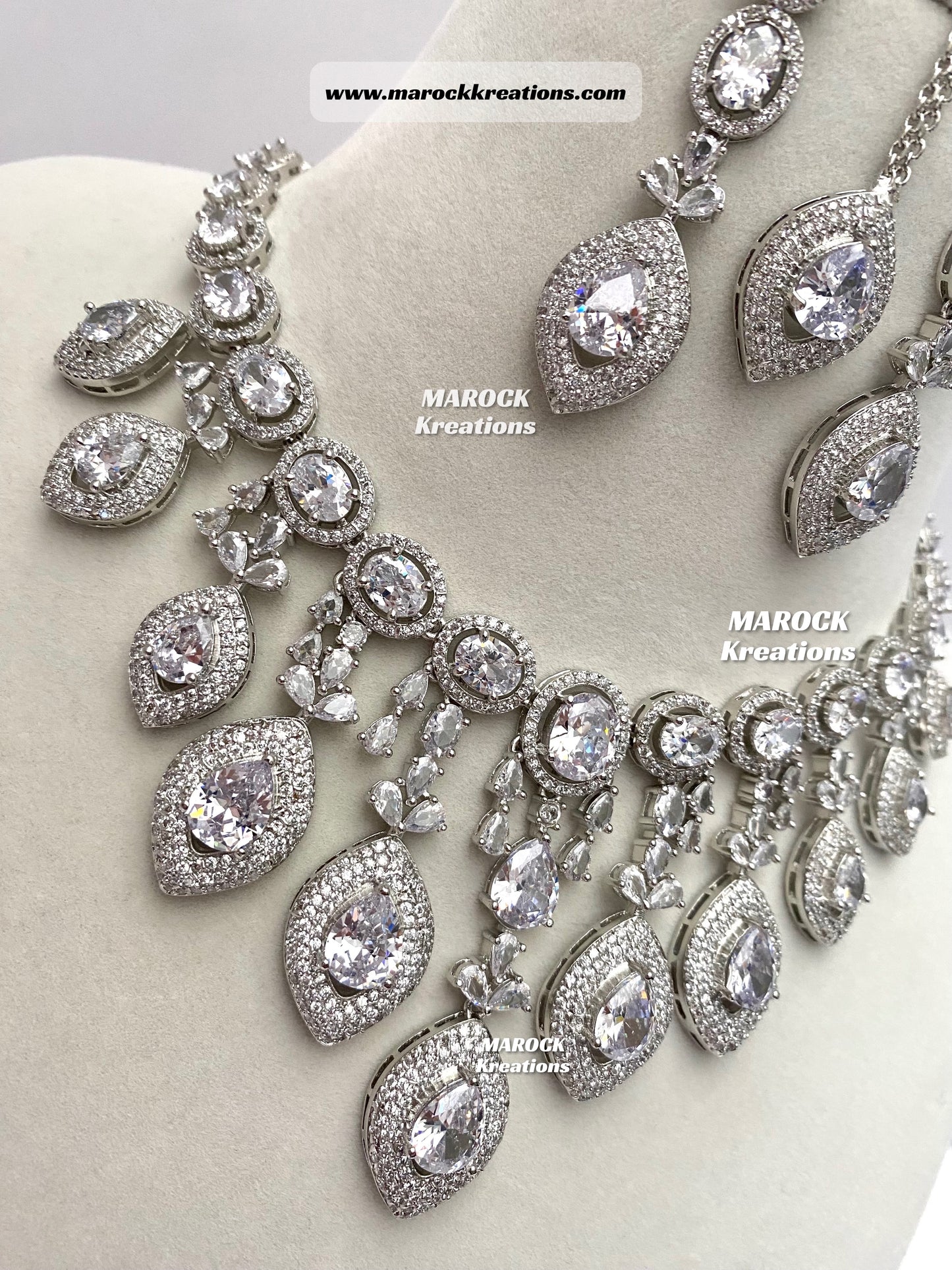 Silver American Diamond Necklace set comes with earrings and tikka