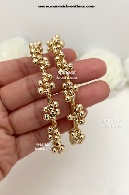 Bailey Gold toned ghungroo style clusters bangles (come in a pair)