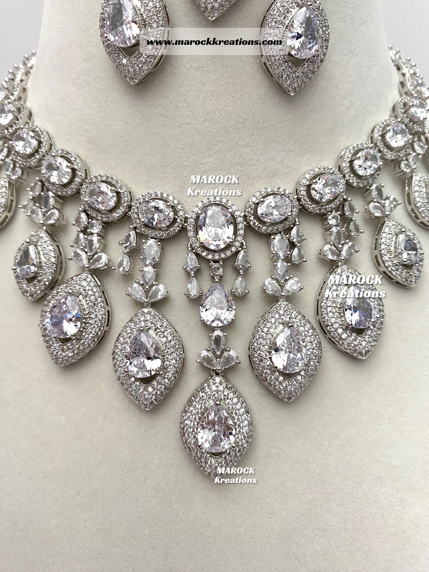 Silver American Diamond Necklace set comes with earrings and tikka