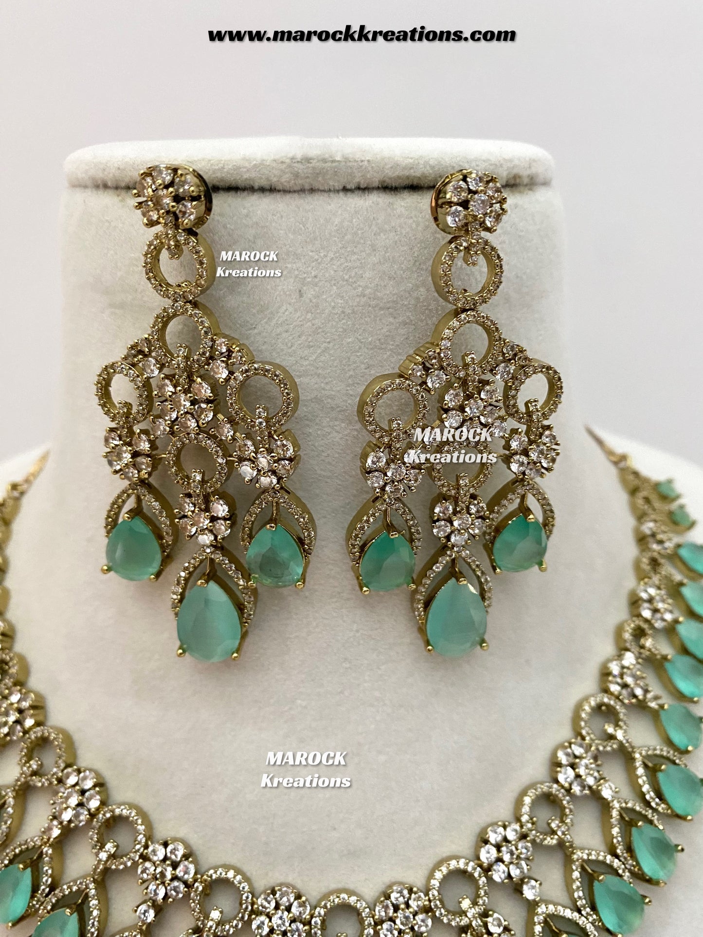 Anshika Antique Gold American Diamond Statement Necklace set