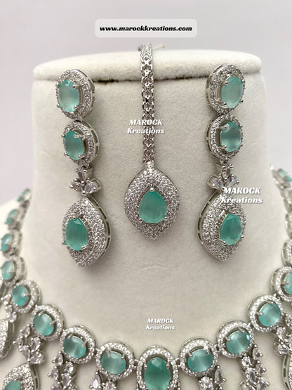 Silver American Diamond Necklace set comes with earrings and tikka