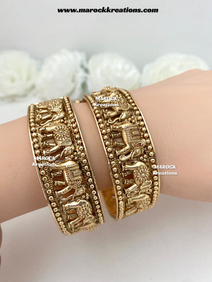 Afrin Gold plated elephant handcrafted openable screw statement kade/bangles