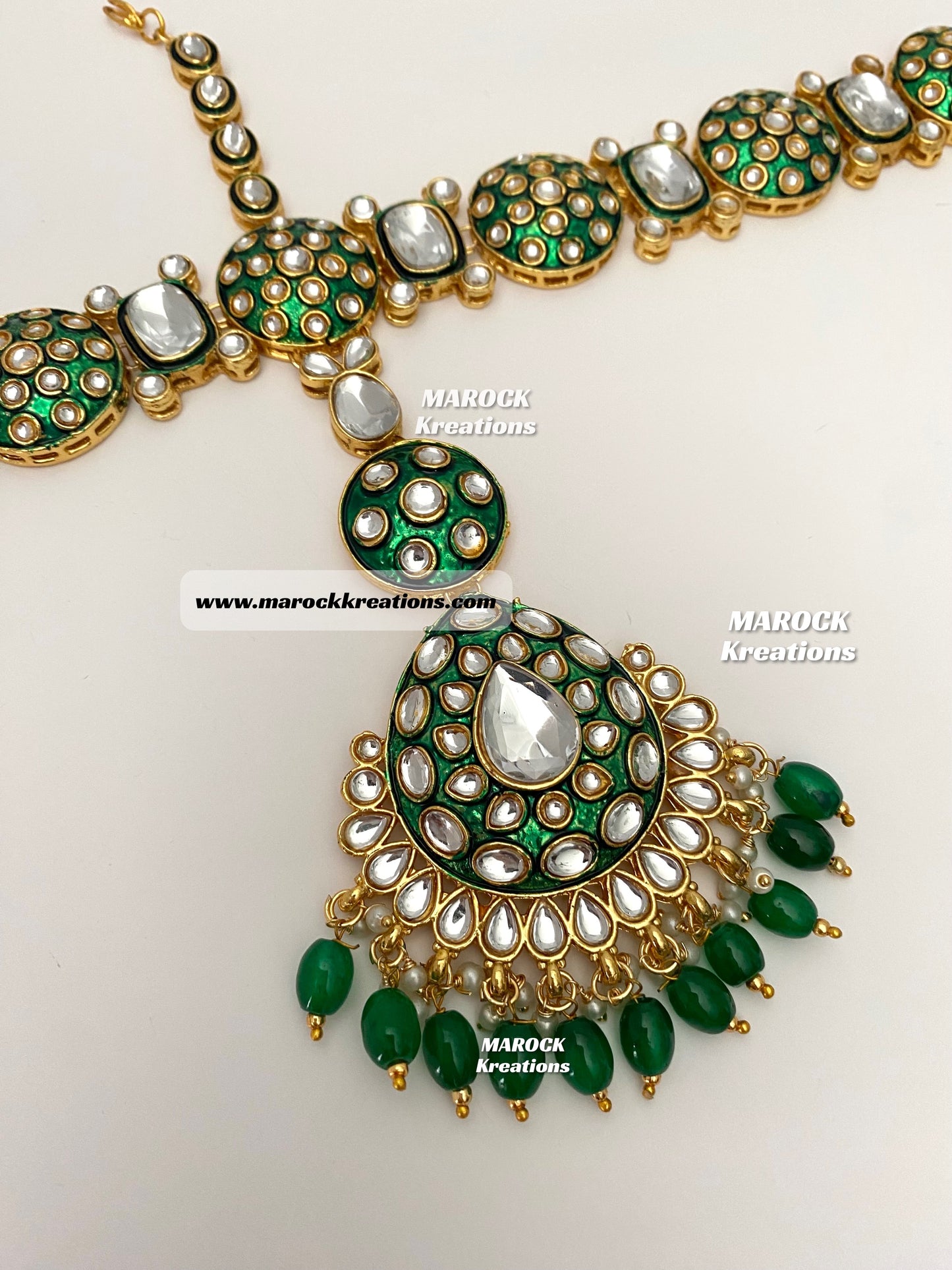 Trendy Uncut Kundan Green Meenakari Statement Bridal set